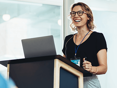 Woman speaking at lectern