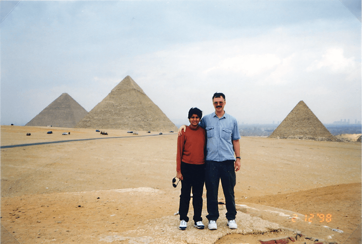 Spear and her husband, Steve, in front of the Pyramids of Giza in Egypt during one of their trips.