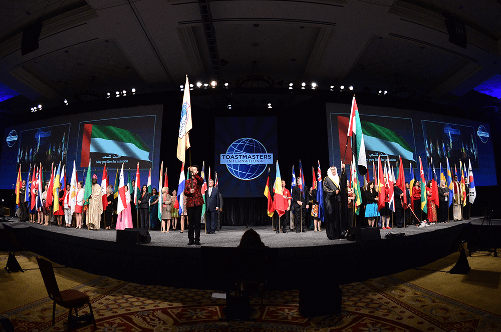 International flags being held onstage