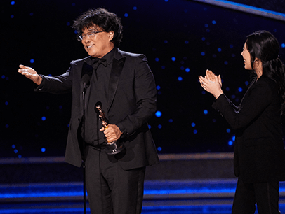 Bon Joon Ho accepting award onstage 