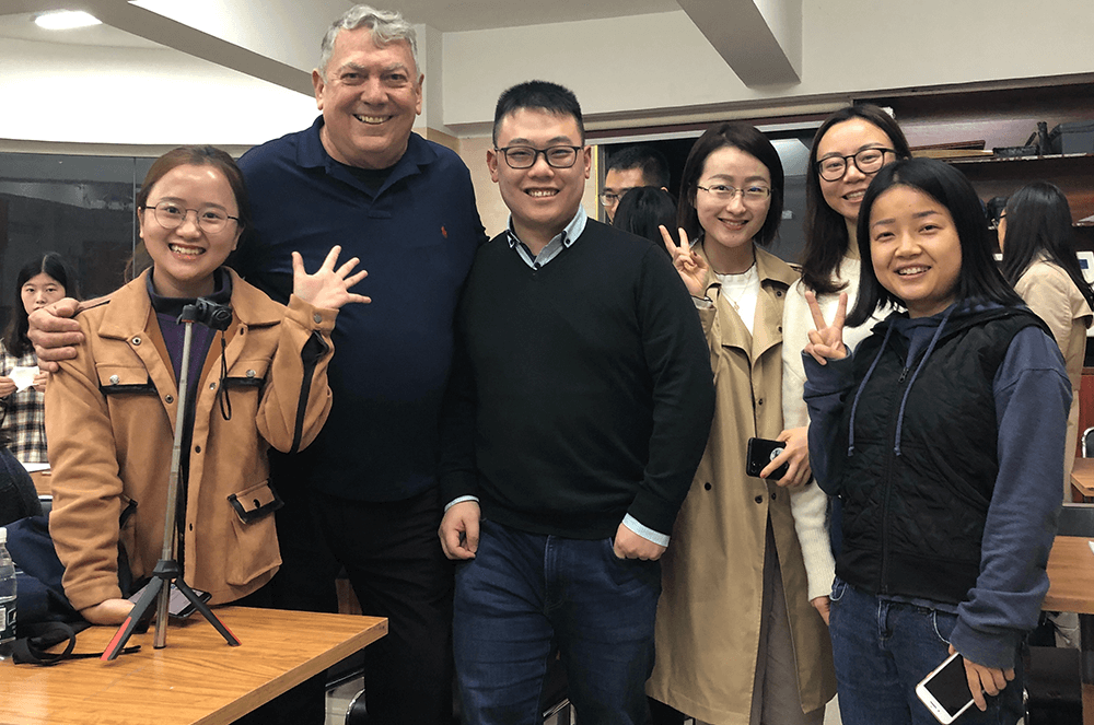 Lance Webster, DTM, of North Hollywood, California, with friends he made in Chengdu, China.