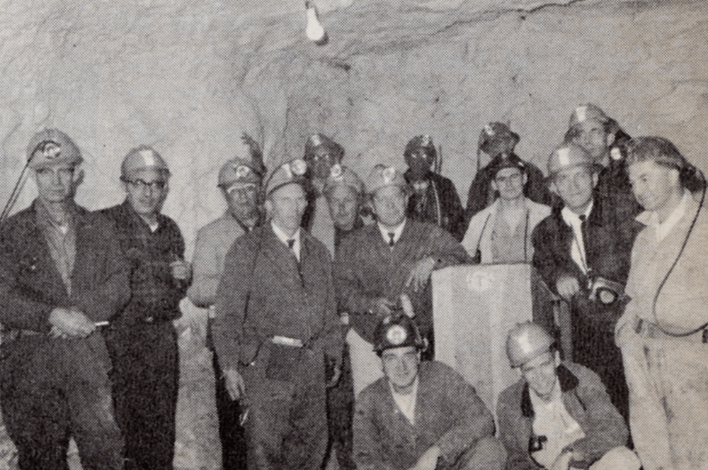 Members in Michigan conduct a meeting in 1966 in an underground mine (complete with a Toastmasters lectern).