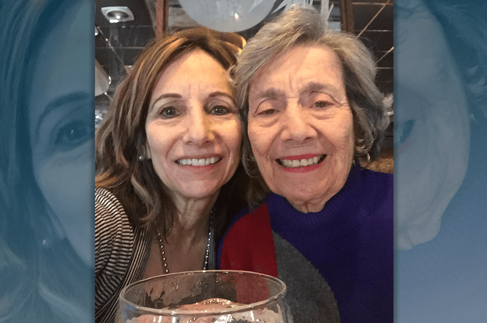 Mother and daughter smiling for selfie