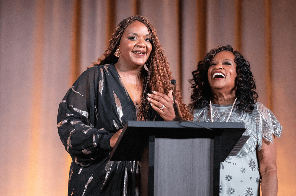 Toastmasters Jessica Allen and Joan Lewis, a mother-daughter duo who co-hosted the convention, welcome attendees at Opening Ceremonies.