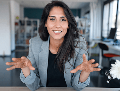 Woman speaking to camera using hand gestures