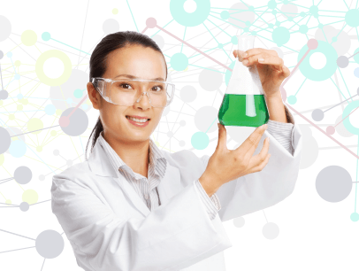 Woman in white lab coat holding beaker